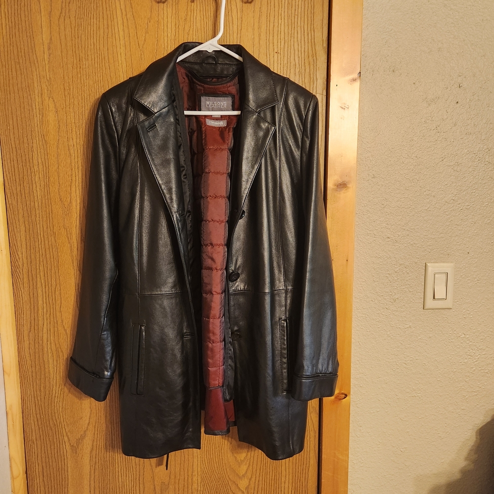 Wilsons Leather Black Jacket with Iridescent Burgandy Lining. Inside Vest.